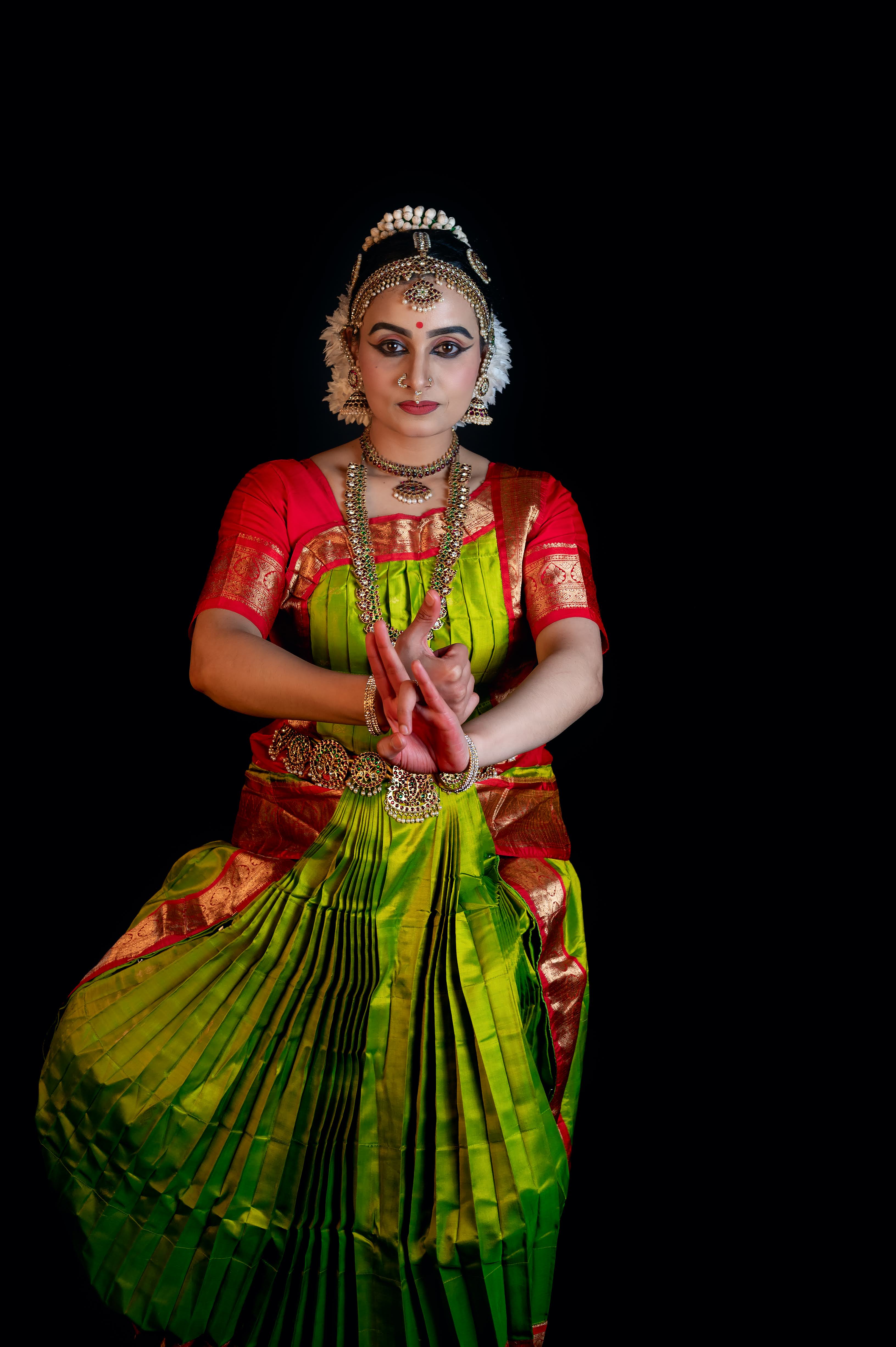 Sherin Jose in a composed wide mudra frame